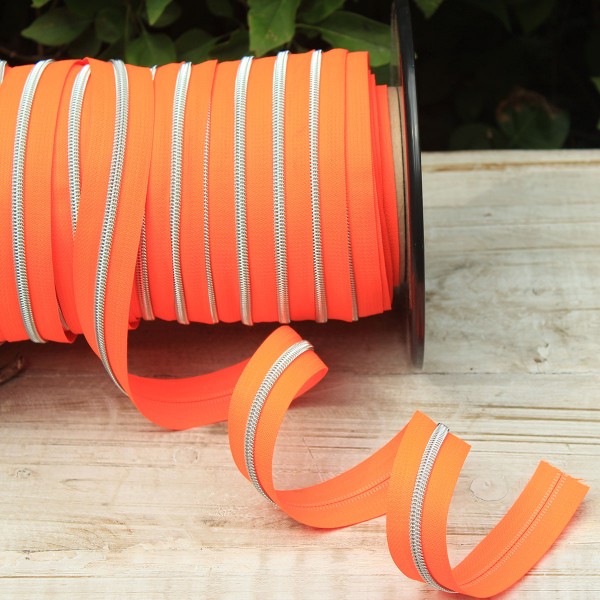 Reißverschluss metallisiert neonorange/silber
